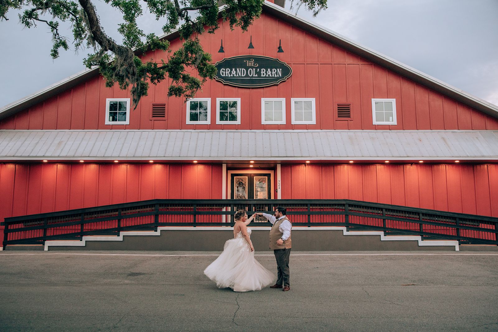 bride and groom dance outside the grand ol barn in new smyrna beach