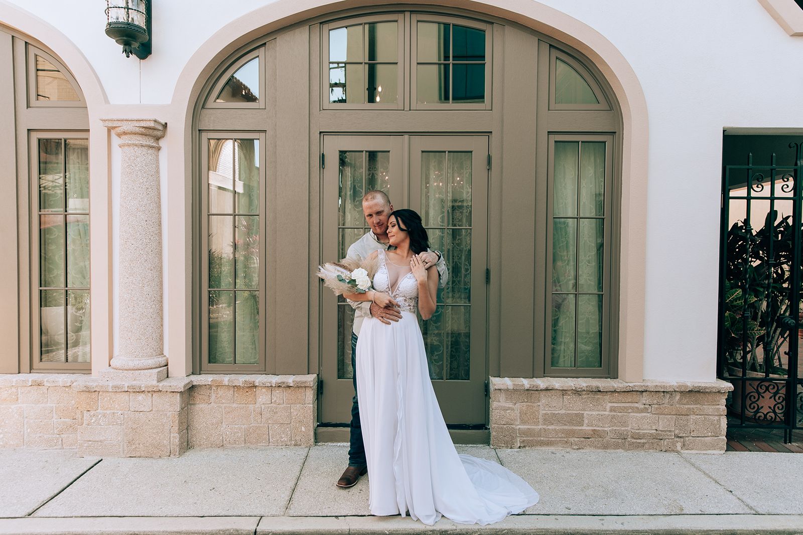 bride and groom outside of 9 aviles venue in st augustine