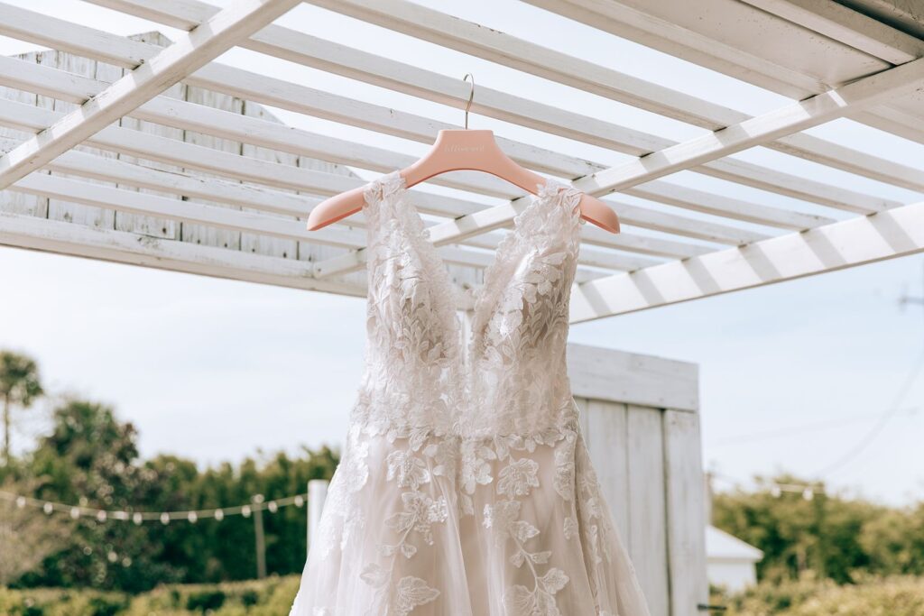 brides dress hanging outside of peach barn in mims florida